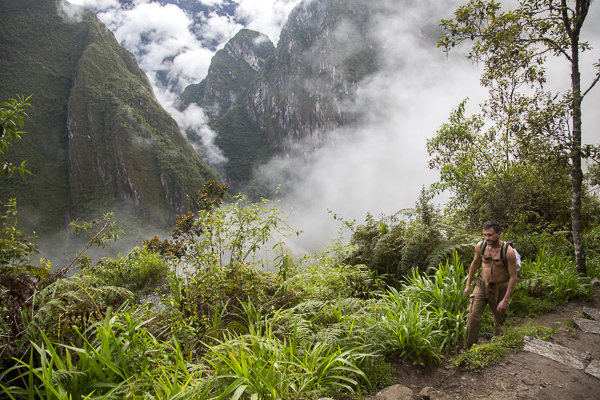 To get to the site from Agua Calientes, one can either wait in long lines for the busses that snake up the mountain every 15 mins or one can hike up the steep Andean stairs for about two hours. The hike up was peaceful with some stunning views of the shrouded Andean mountains. We only ran into one other hiker--a Frenchman who appeared about to pass out. 