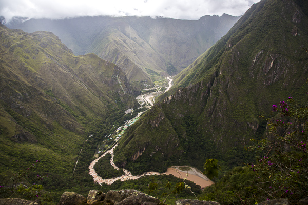 Machu Pichu is surrounded on three sides by the Urubamba River with cliffs dropping vertically almost 1,500 ft.  The Urubamba accounts for the morning mists which rise up from its waters.