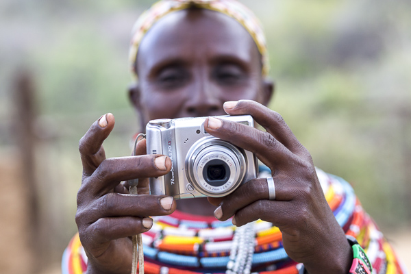 Mampayun Lemartili practices using her camera.